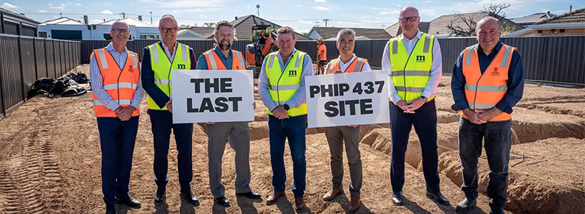 Executive Director Mark Hayward (left) and Director Joe Noone (third from left) along with Metricon Homes team at the Seaton site