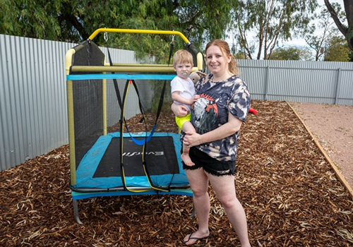 Port Pirie resident holding her young son