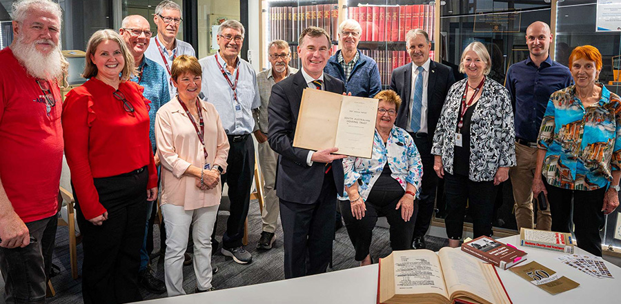 Minister Nick Champion with SA Housing Trust Memorabilia Committee volunteers and staff