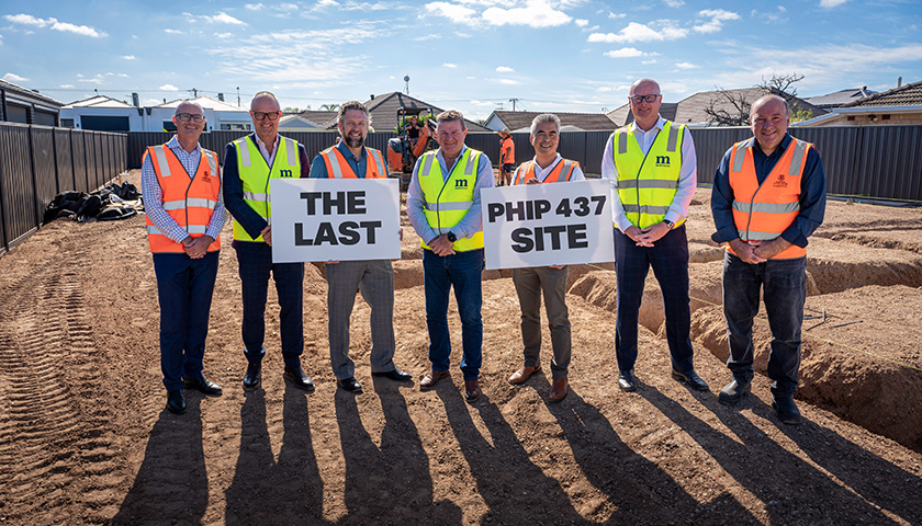 Left: SA Housing Trust 1st-Executive Director Mark Hayward, 3rd-Director Joe Noone and Right: Metricon Homes team at the Seaton site