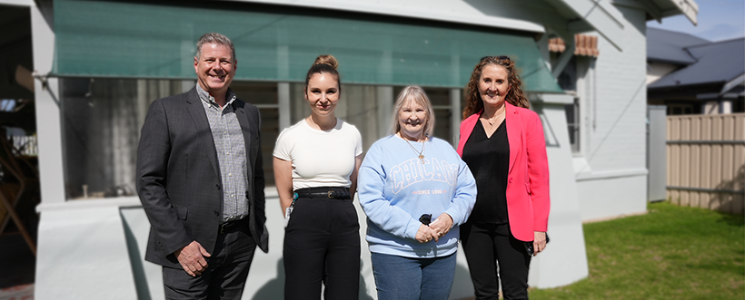 Pictured at a SA Housing Trust home that underwent an energy upgrade recently. In the picture, Left to Right: Christopher Thomas, Manager - Maintenance & Renovations; Grace McGradey, Project Manager  Maintenance & Renovations; Janet Knott, our lovely tenant who lives in this house; and Kellie Lambert,  Manager - Maintenance & Renovations